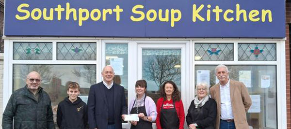The cheque presentation at the Southport Soup Kitchen.