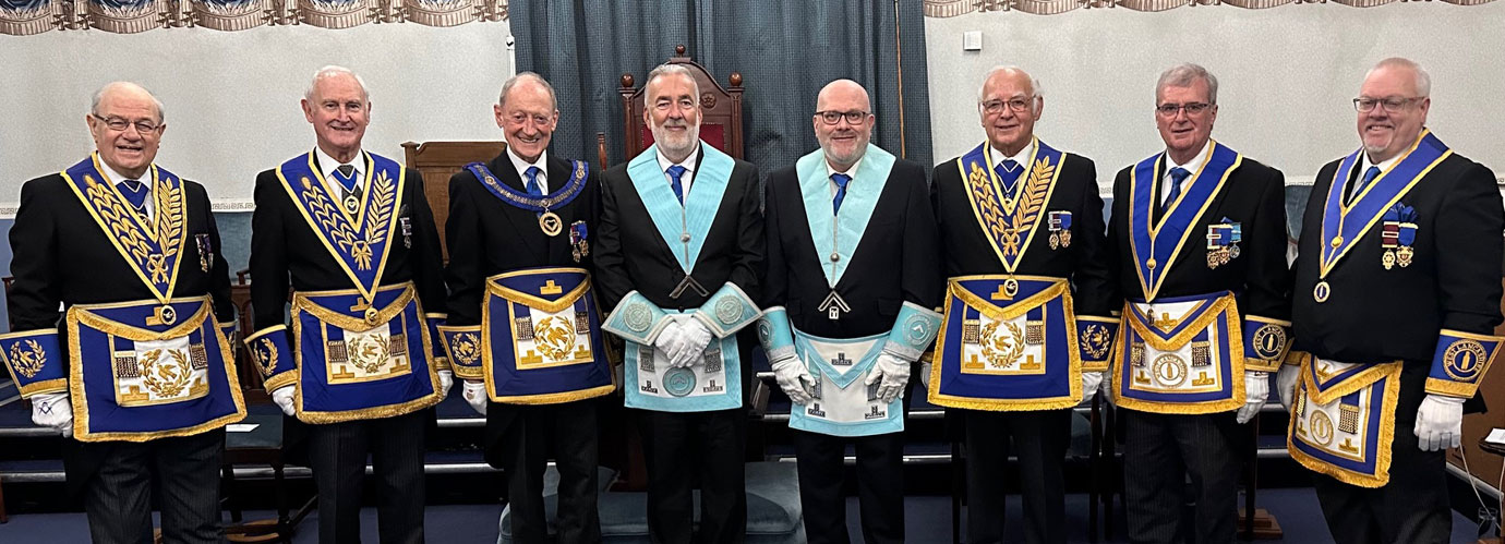 The distinguished Freemasons supporting the new master of the lodge at the installation and cheque presentation.