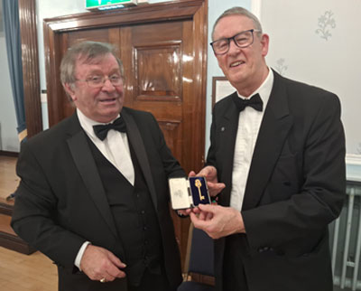 The key being returned from Alan Cornes (left) to Robert Collins.