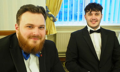 Jordan Potter (left) relaxes with his brother Harry at the festive board.