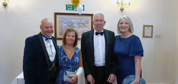 Pictured from left to right, are: John Cross and his wife Shelagh and Mark Mattews and his wife Debbie.