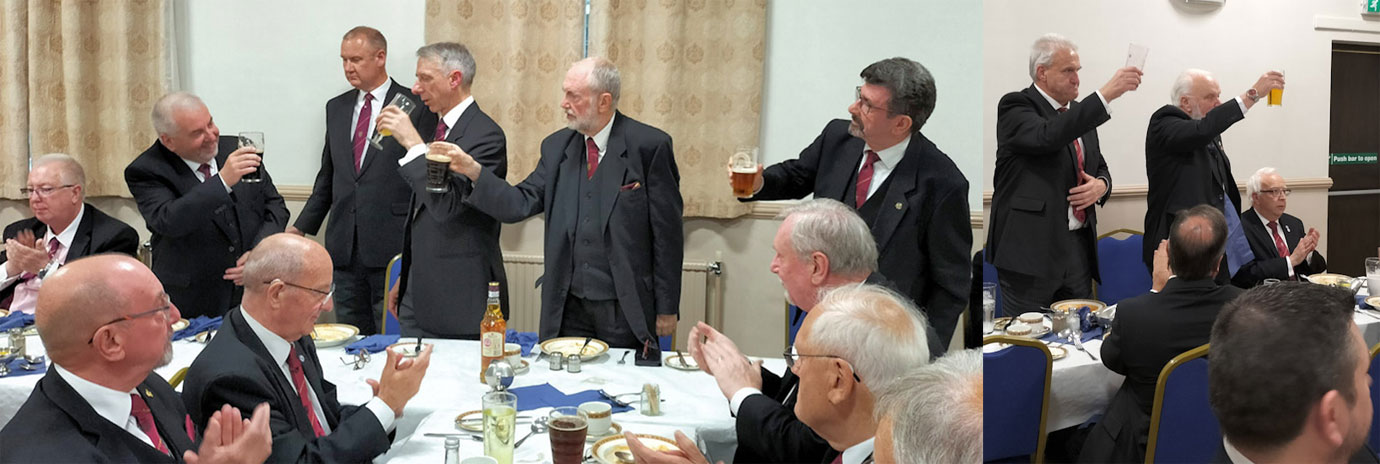Pictured left: Chris Butterfield (standing left) receiving the toast from the newly installed principles. Pictured right: Andrew Whittle (left) and David Redhead toasting the principals.