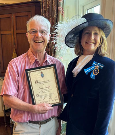 David receiving his certificate from Clare Hayward the High Sherriff of Cheshire.