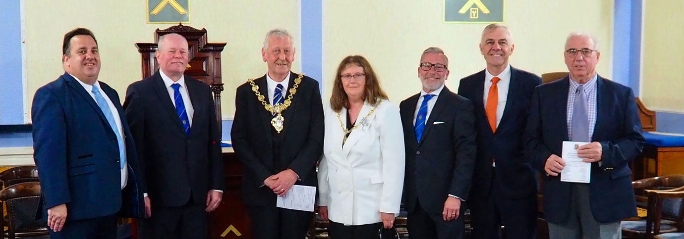 Pictured from left to right, are: Michael Tax, Duncan Smith, Councillor Peter Hunter, Anne-Marie Hunter, Bob Marsden, Stephen Jelly and Colin Goodwin.