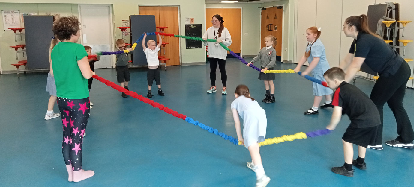 Children doing their exercises, which teach neuro-divergence and muscle memory through exercises.