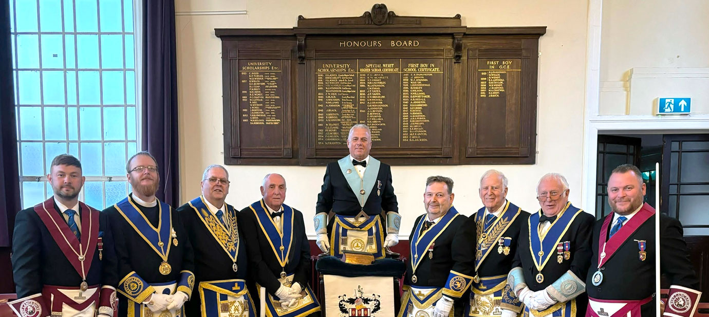 Pictured from left to right, are: Paul Wharton-Hardman, Fr Matthew McMurray, Neil Ward, John Medcalf, John Topping, David Topping, Malcolm Worsley, Jeff Lucas and David Grime, in front of the recently refurbished honours boards.