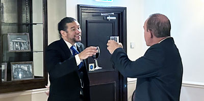 John Conlon (right) toasts Matt Casson at the festive board.