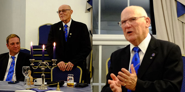 Pictured left: Neil Curtis (right) toasting Rob Clark’s health at the festive board. Pictured right: Peter Robinson speaking at the festive board.