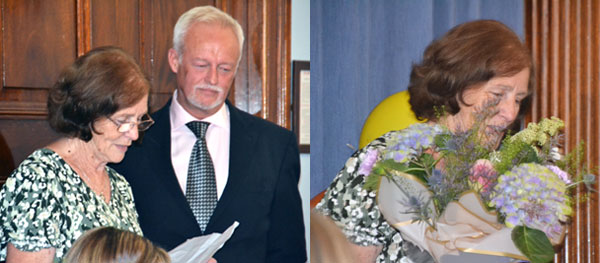 Pictured left: Phil Stock and Julie McGee. Pictured right: Julie receives her flowers.