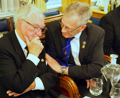 Carl Spindler presents Peter with a diamond cut decanter.