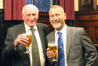 A time to relax, Trevor (left) enjoys a pint with Roy Hayes.