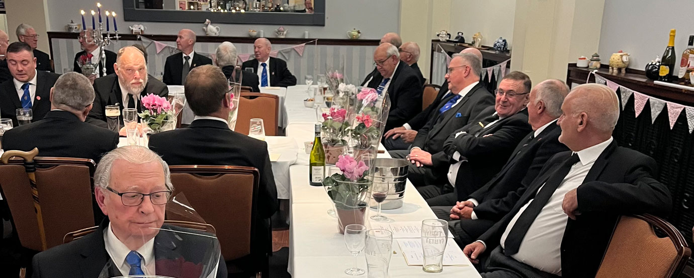 Festive board adorned with the potted plants.