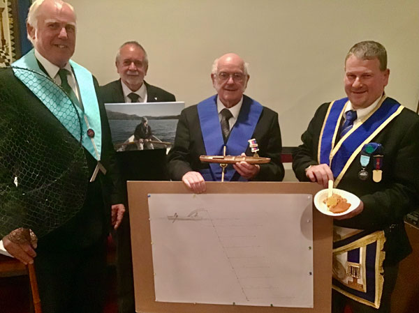 David Kellet explains a number of char-fishing artefacts, including the taste samples of char. Pictured from left to right, are: Ian Heyes, Keith Young, David Kellet and Richard Dennison.