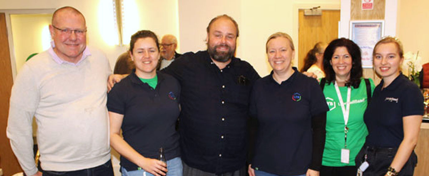 Ezra (centre) with Ashley Swallow and other members of the local company LYB and Trafford Group Mentor Andy Lane.