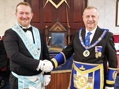 David Peacock (left) being congratulated by Peter Lockett