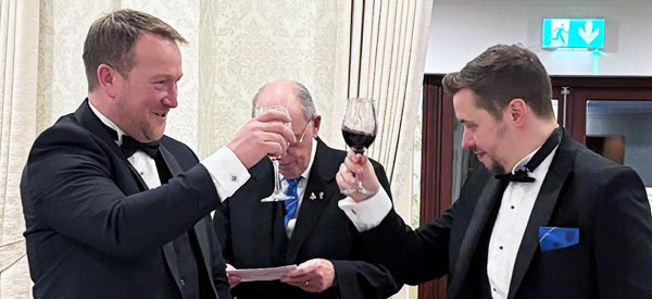 David Peacock (left) and Jonathan Battersby toasting at the festive board