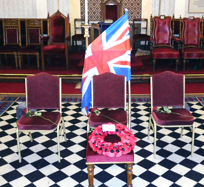 The tableau itself, three empty chairs symbolising the three brethren of the lodge who perished in the Great War, Major Thomas William Aston Bagley, Captain Charles Richardson Hird and Captain Hans Robert Sparenborge.