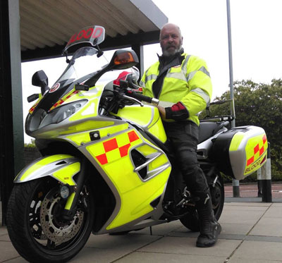 Mike Ashton on a North West Blood Bike.