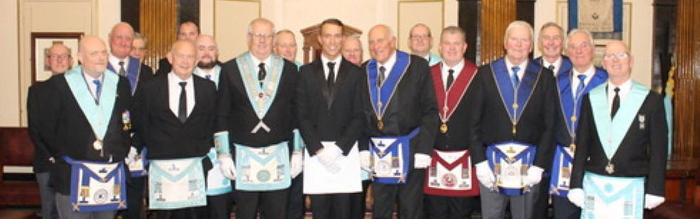 Adam Norris (central) and the brethren of Woodend Epworth Lodge and several guests.