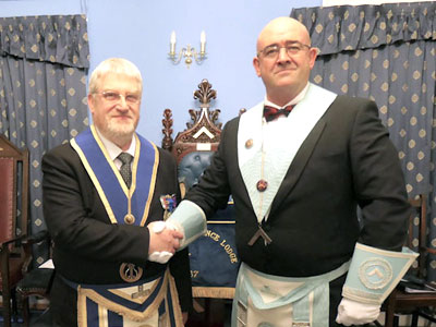 Colin Porter (left) congratulated by Alan Down on becoming an honorary member