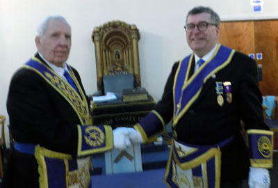 Roy Astley (left) congratulates Paul McLachlan.