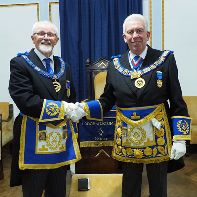 Dave Barr (left) being congratulated by Mark Matthews.