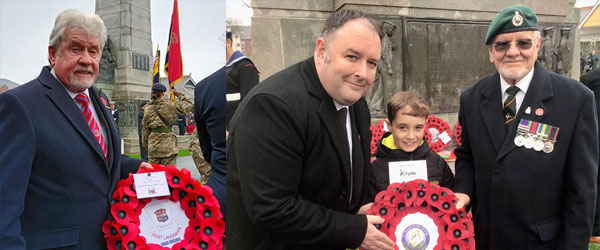 Pictured left: Geoff Crosland with his poppy wreath. Pictured right: Ben Gorry (left) and Ray Pinkstone (right) explain the significance of the poppy wreath to Arran Gorry.