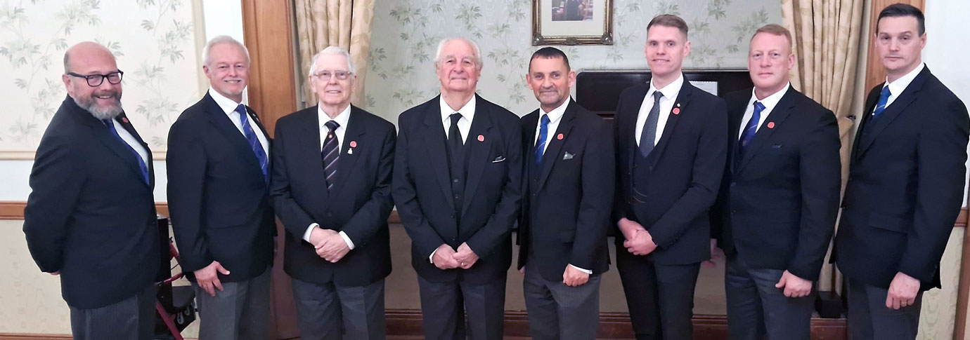 Don Cox (fourth left) with David Thomas to his left, with the Provincial team, grand officers and the IPM Dave Colley (third right)