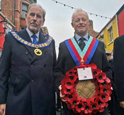 Frank Umbers (left) and Phil Stock holding the wreath before the parade.