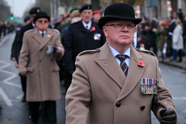 Major Nick McEntee (Retd) solemnly leading the column of veterans.