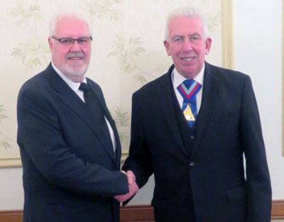 Laurence Walsh (left) being congratulated by Mark Matthews.