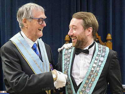 Michael (left) helping David laugh to relieve the stress