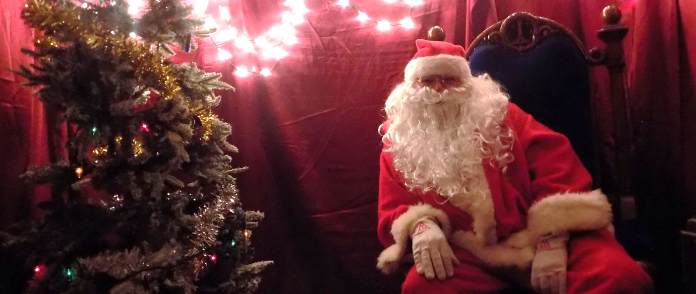 Father Christmas all ready to receive children