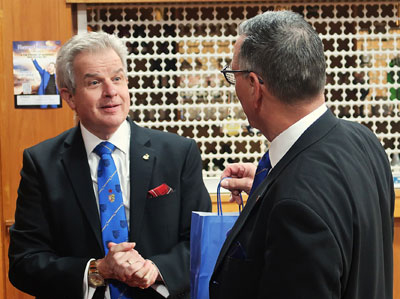 Stuart (left) receiving the ‘Trafford treats’ from Eddie Wilkinson.