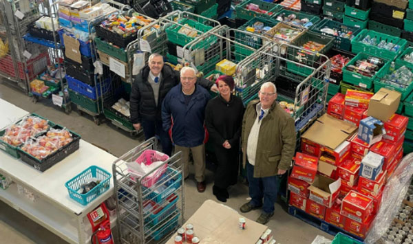 Pictured from left to right, are: Steve Jelly, Colin Goodwin, Victoria Blakeman and Neil Higgins in the food bank warehouse.