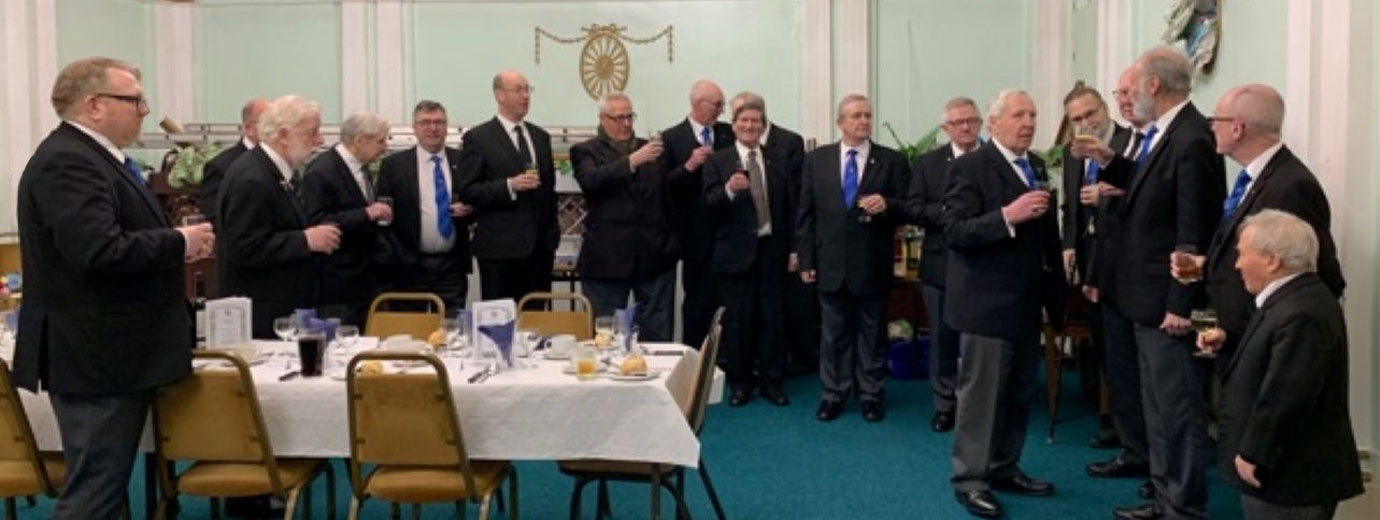 Brethren and guests of Liverpool Lodge preparing for the festive board.