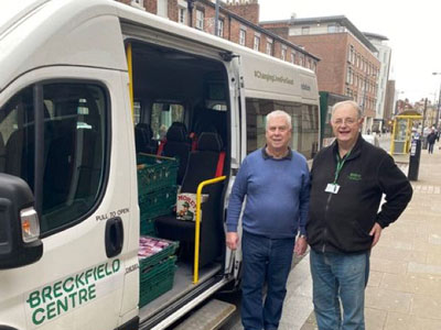 Dave Johnson (left) and Paul Robinson MBE loading food into the BNENC’s minibus.