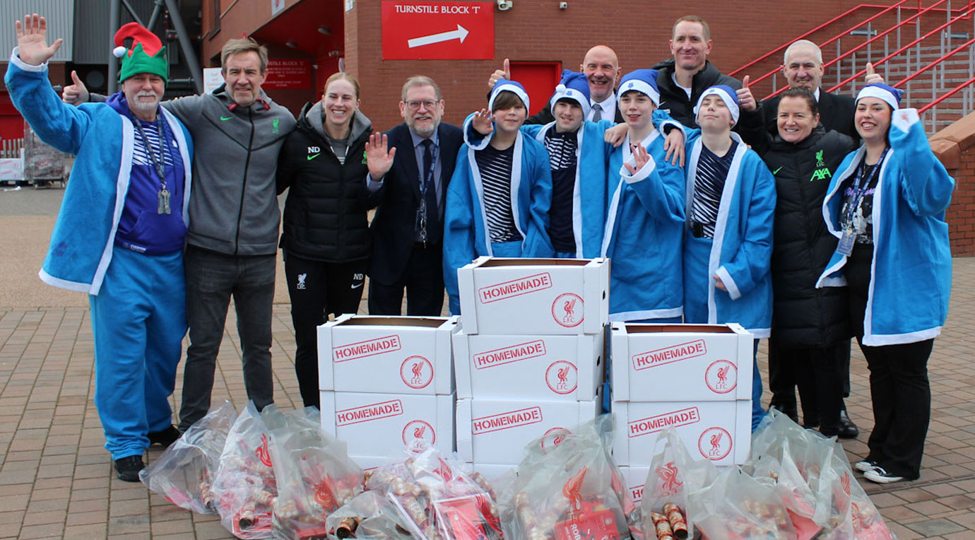 Andy, Chris and Andrew with the foundation team and students whose families will benefit from the hampers