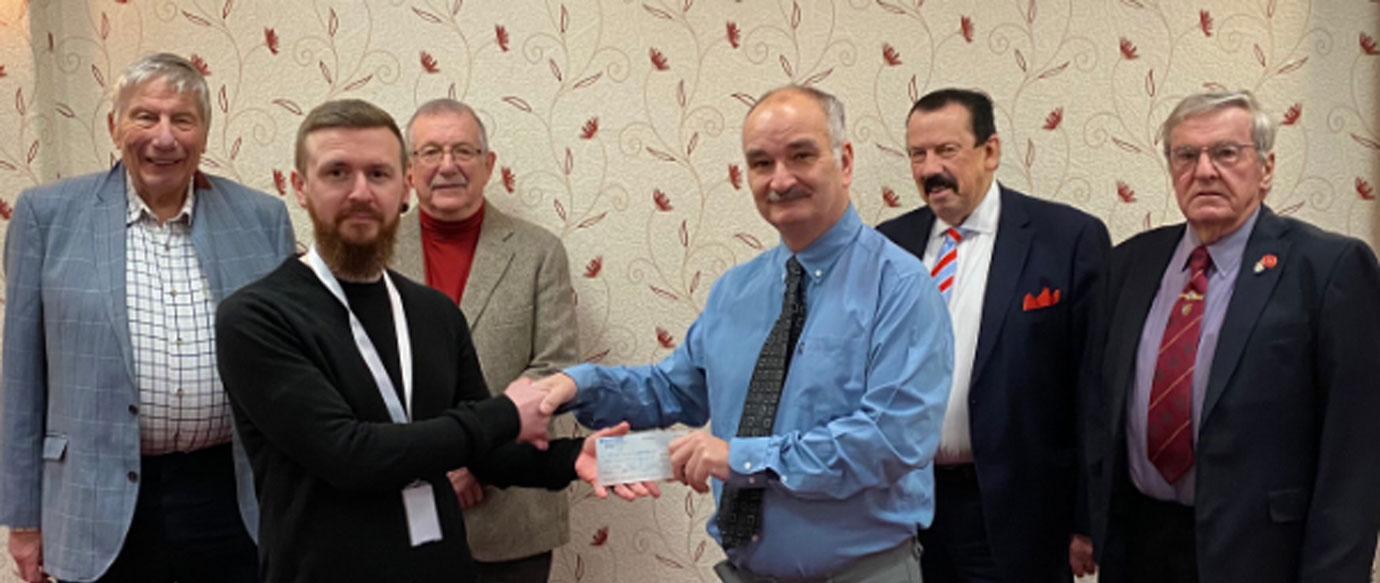 Pictured from left to right, are: Michael Dickinson, Tom Wyatt, Steve Willingham, Shaun Haynes (presenting a cheque to Tom Wyatt), Norman Thomas and Derek Broadbent.