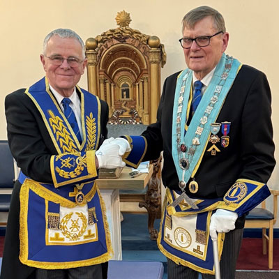 Colin Jenkins (left) congratulates William Cropper.