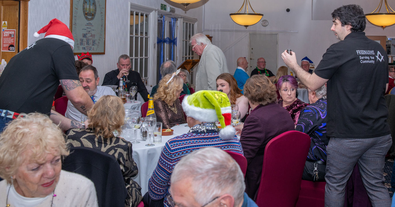 David Jenkinson (left) and Jon Boriss, top up gin glasses around the tables.