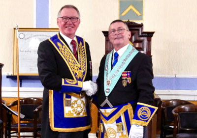 John Robbie Porter (left) congratulating Gordon Major (WM)