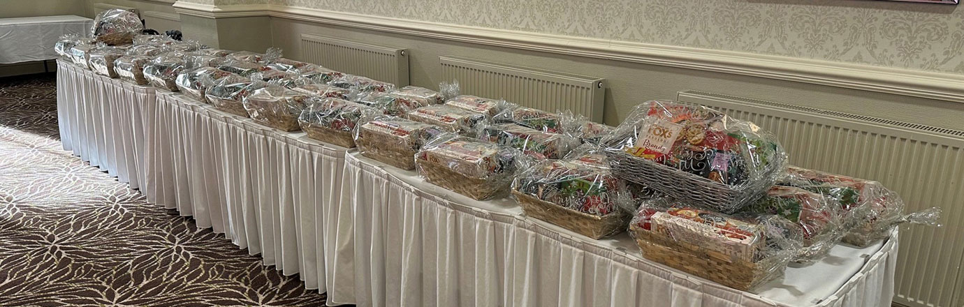 A long line of hampers for each guest to take home.