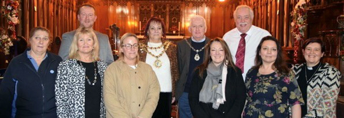 Recipients of Tyldesley Lodge’s charity donations with Tyldesley Lodge members and Wigan Borough Mayor