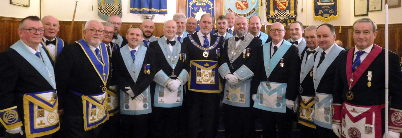 Pictured centre from left to right, are: Andrew Greenwood, Frank Umbers and Matty Woods with the brethren of Hartington Lodge.