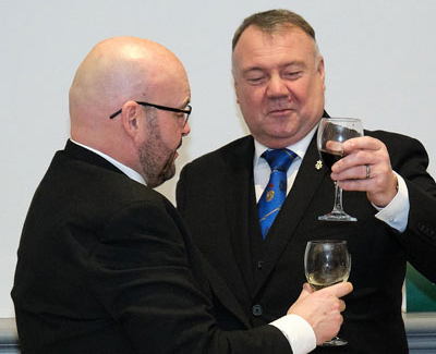 Adrian (left) being toasted his health by Paul Hook.