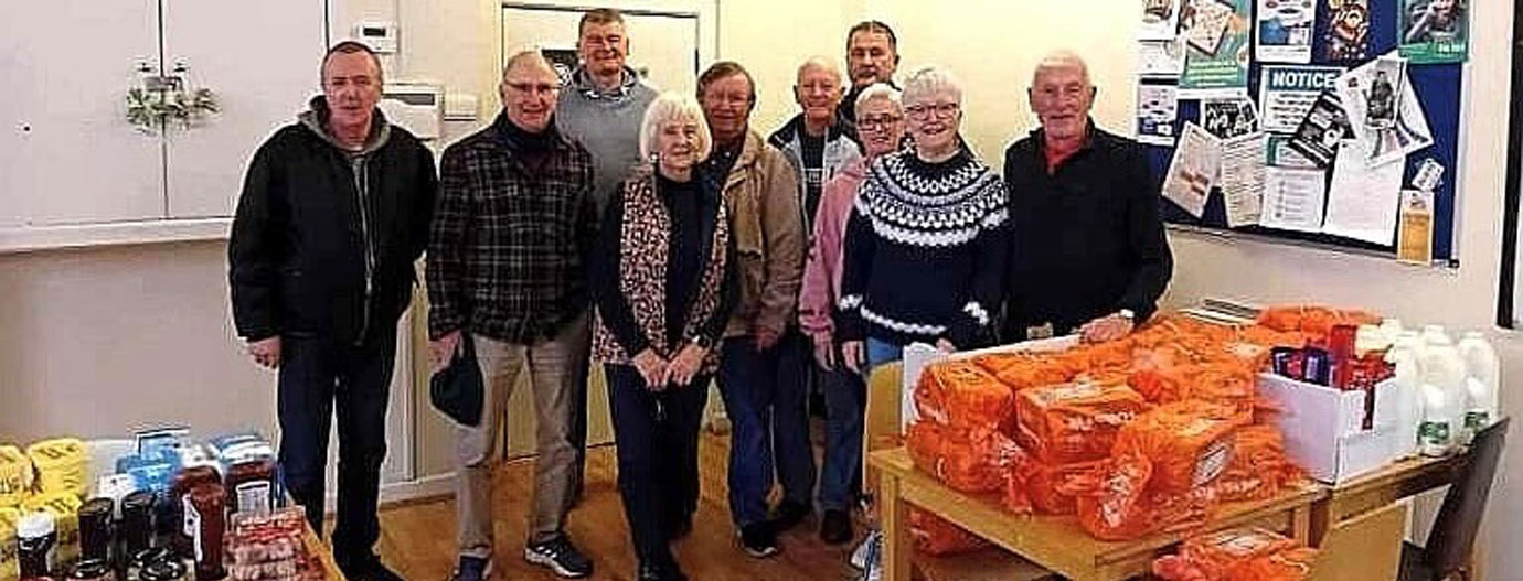 Alan Cornes and Eddie Thompson deliver food to the Christmas Shelter volunteers.