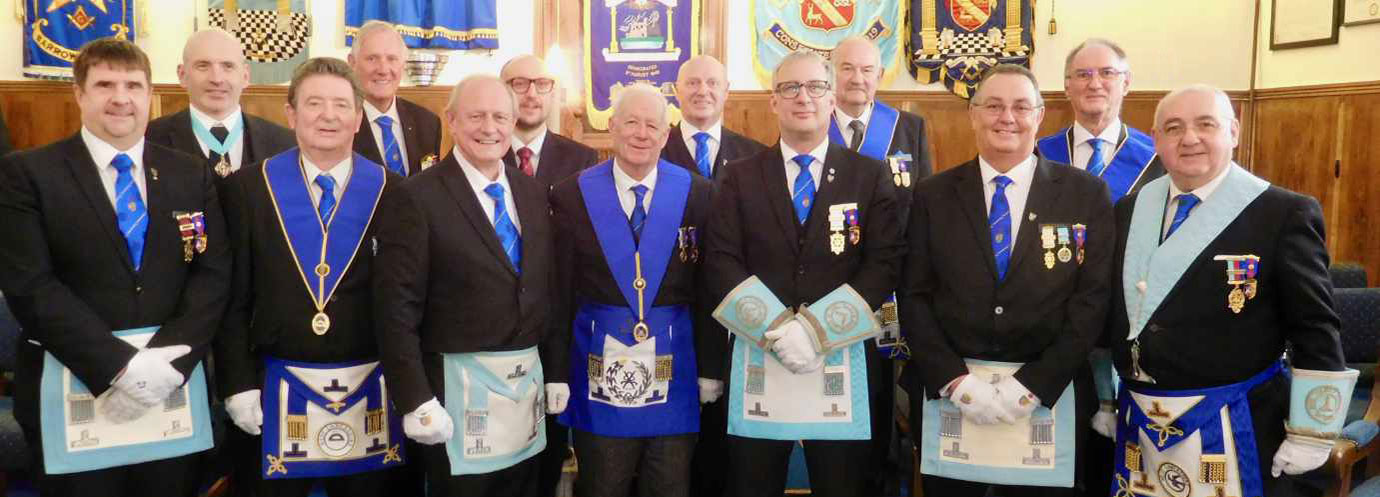 11 visiting masters with Stewart Cranage (centre) and Nick Collinge (centre right).