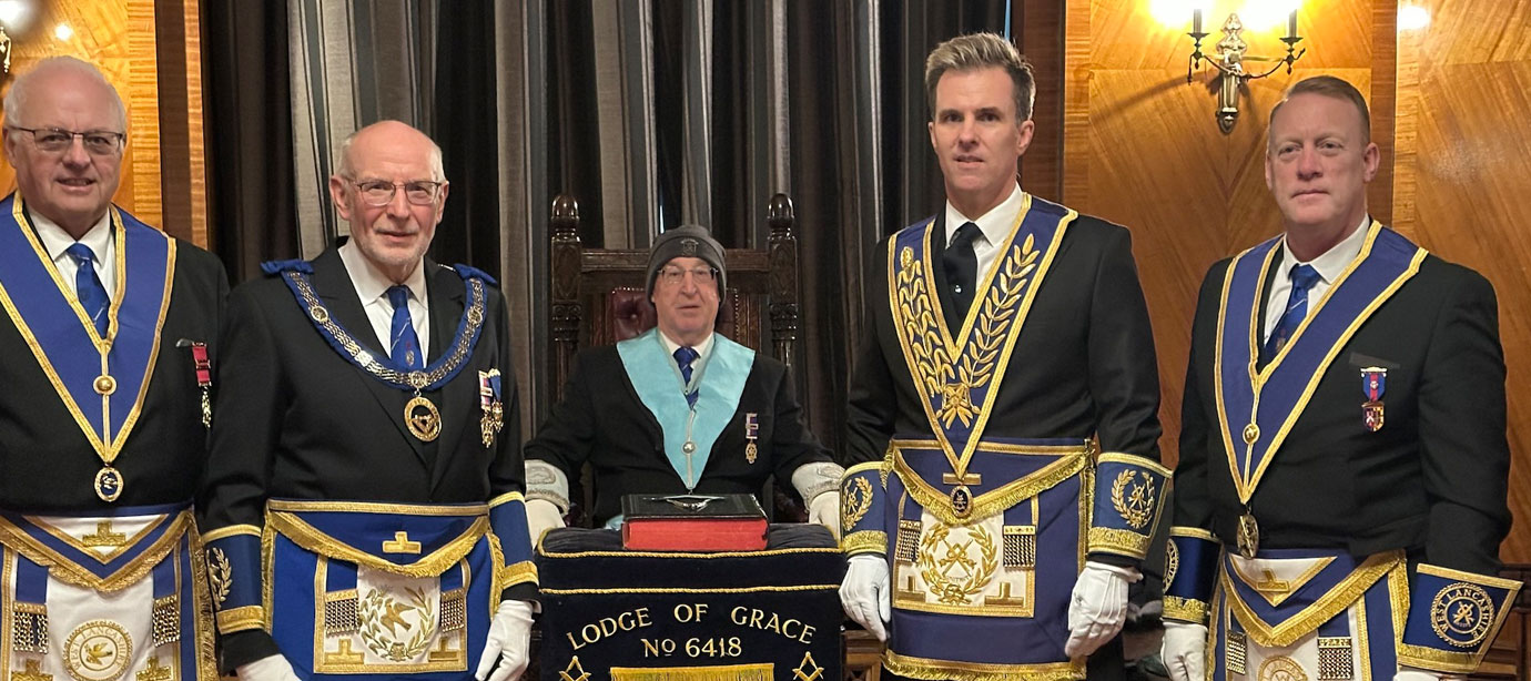 Pictured from left to right, are: John Reynolds, John James, Alan Morris, Paul Storrar and Dean Walters celebrating with Alan.