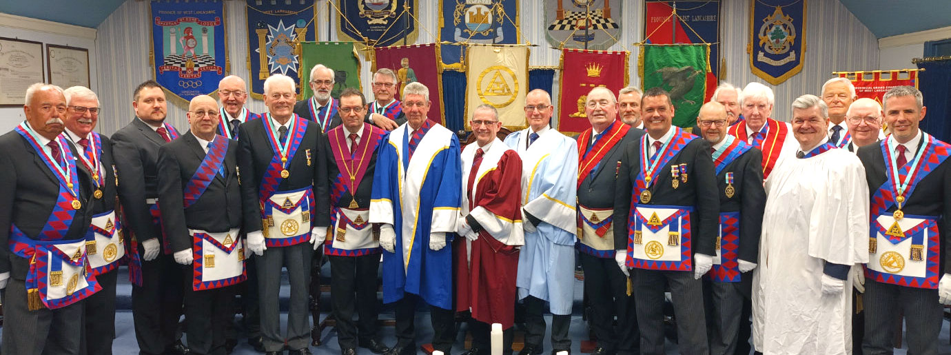 The three principals (centre) with members of the chapter.